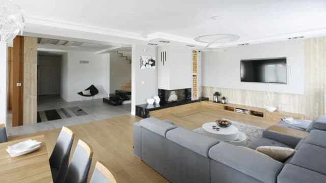 Biało-szary salon: 10 pomysłów na dodatki, które go ożywią